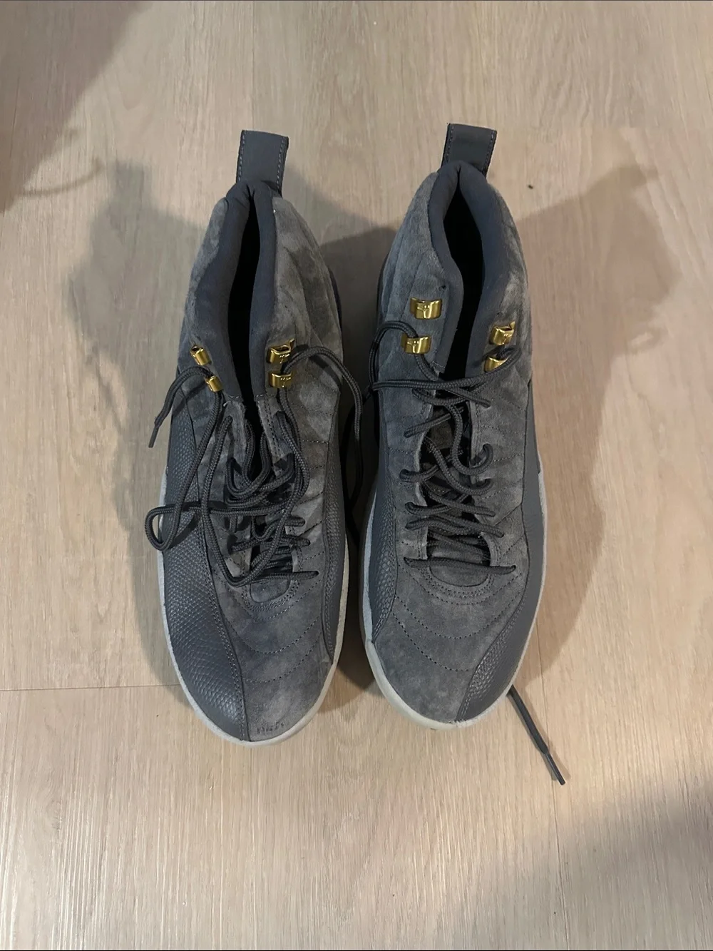 Air Jordan 12 Men's Gray and White Athletic Shoes with Gold Accents
